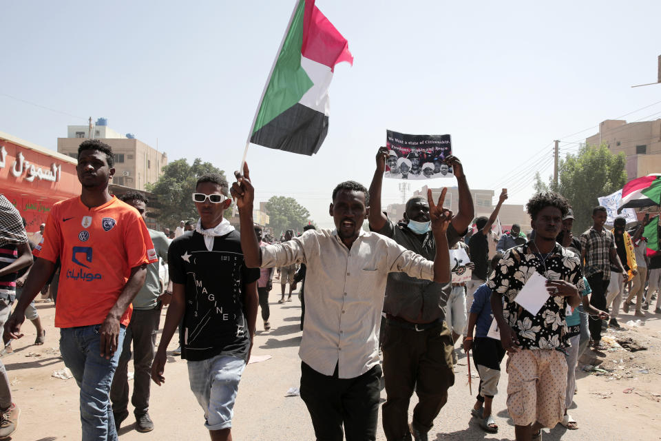 Sudanese demonstrators attend rally to demand the return to civilian rule nearly a year after a military coup led by General Abdel Fattah al-Burhan, in Khartoum, Sudan, Tuesday, Oct.25, 2022. (AP Photo/Marwan Ali)