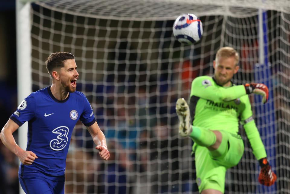 Winner:  Jorginho celebrates his penalty as Leicester keeper Kasper Schmeichel kicks the ball away in frustrationAP