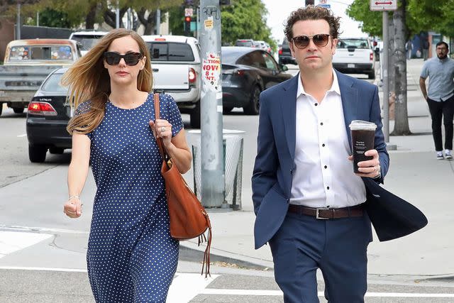 <p>BACKGRID</p> Danny Masterson is seen arriving at court with wife Bijou Phillips on May 30, 2023