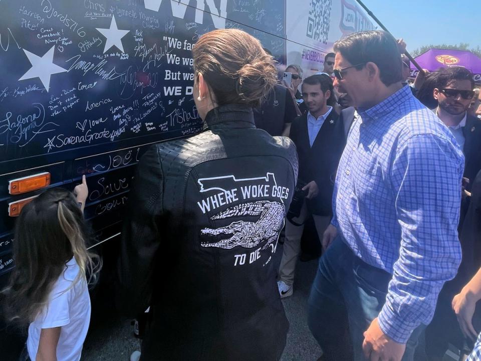 Casey DeSantis wearing her leather jacket advertising Florida as ‘where woke goes to die’ (AP)