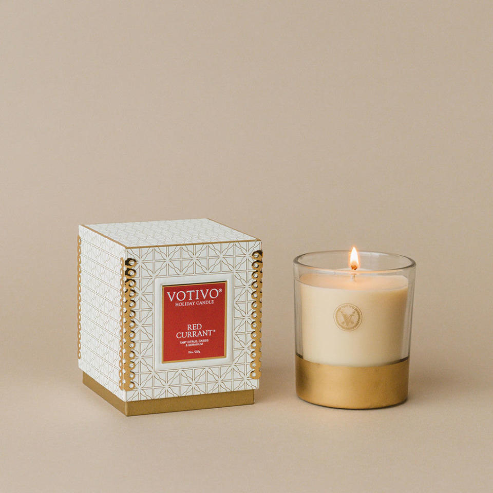 <p><a href="https://votivo.com/collections/red-currant/products/holiday-10oz-candle-red-currant" rel="nofollow noopener" target="_blank" data-ylk="slk:Shop Now;elm:context_link;itc:0;sec:content-canvas" class="link ">Shop Now</a></p><p>Red Currant Candle </p><p>votivo.com</p><p>$32.30</p>