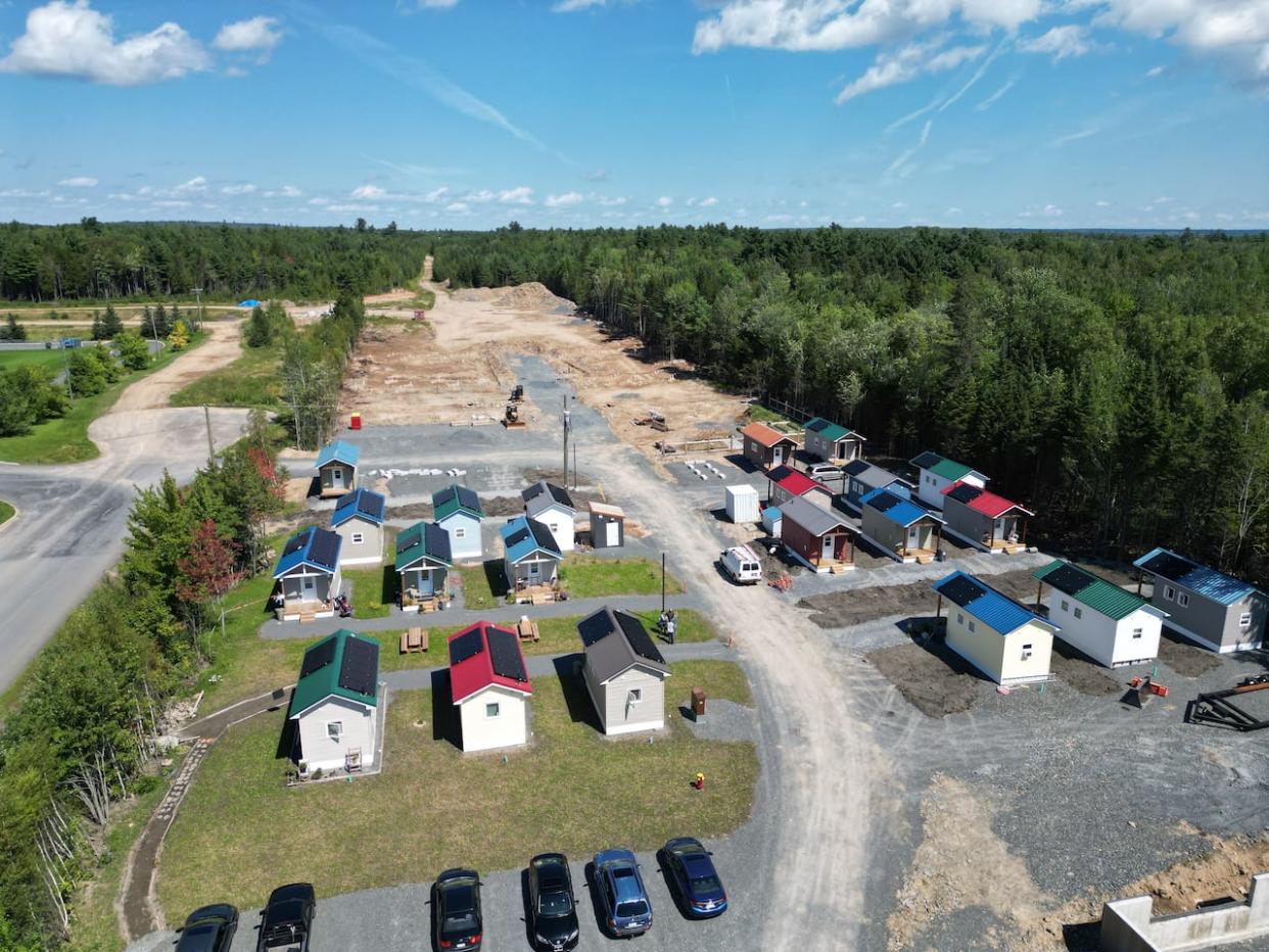 One of the housing options in Fredericton is the tiny home community, 12 Neighbours, seen here in 2022 when it only had 22 homes. As of mid-July, the community had over 60 tiny homes. (Submitted by Marcel LeBrun - image credit)