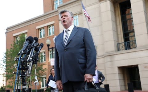 Kevin Downey, Manafort's defence attorney, speaks to reporters outside the US District Courthouse in Alexandria, Virginia - Credit: Chris Wattie/Reuters