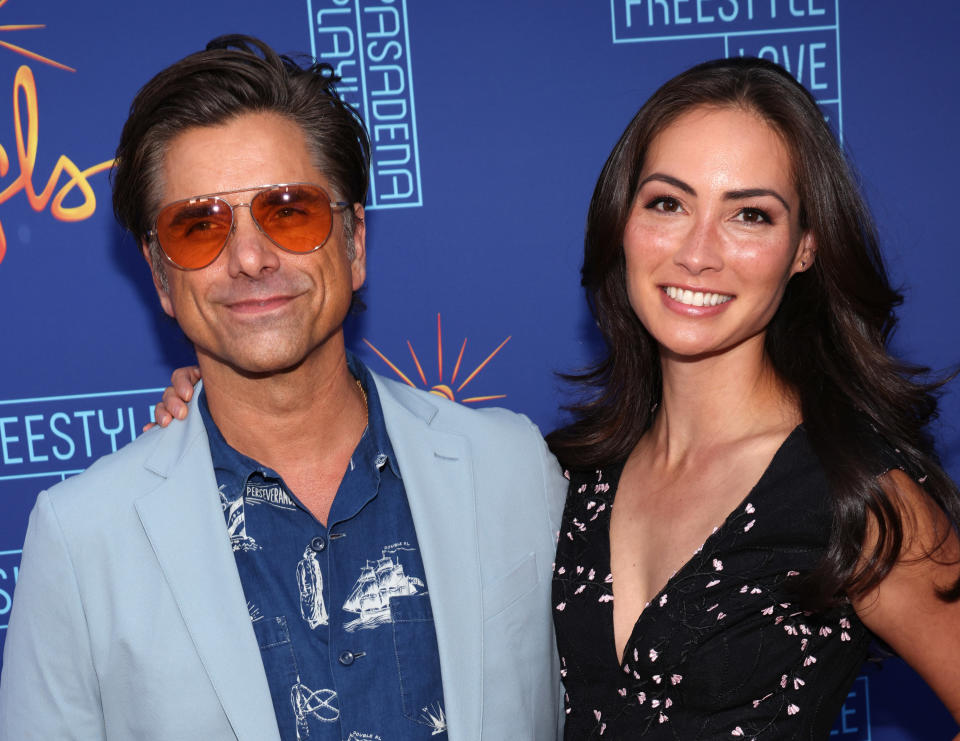 John Stamos and Caitlin McHugh