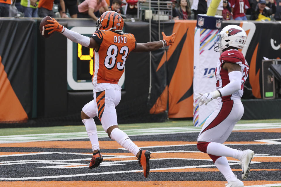 Cincinnati Bengals wide receiver Tyler Boyd (83) runs in a touchdown in the second half of an NFL football game against the Arizona Cardinals, Sunday, Oct. 6, 2019, in Cincinnati. (AP Photo/Gary Landers)
