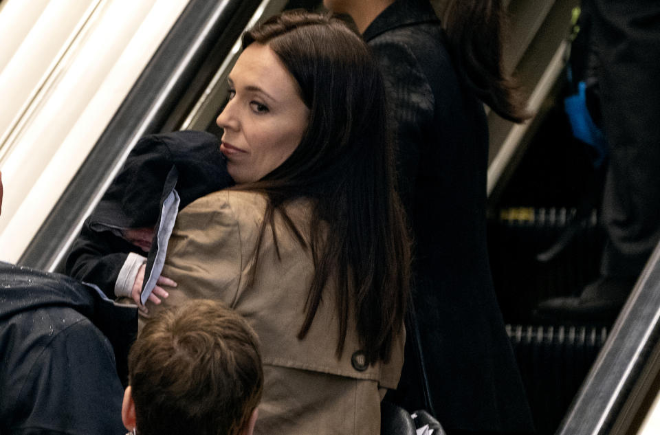 FILE - New Zealand Prime Minister Jacinda Ardern arrives holding her child Neve during the 73rd session of the United Nations General Assembly, at U.N. headquarters, on Sept. 25, 2018. Ardern became just the second world leader to give birth while holding office. When she brought her infant daughter to the floor of the U.N. General Assembly in New York in 2018, it brought smiles to people everywhere. (AP Photo/Craig Ruttle, File)