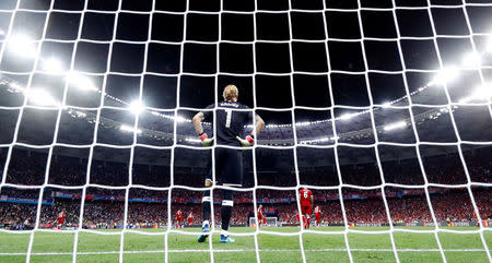 Soccer Football - Champions League Final - Real Madrid v Liverpool - NSC Olympic Stadium, Kiev, Ukraine - May 26, 2018 Liverpool's Loris Karius reacts after conceding their third goal scored by Real Madrid's Gareth Bale REUTERS/Kai Pfaffenbach