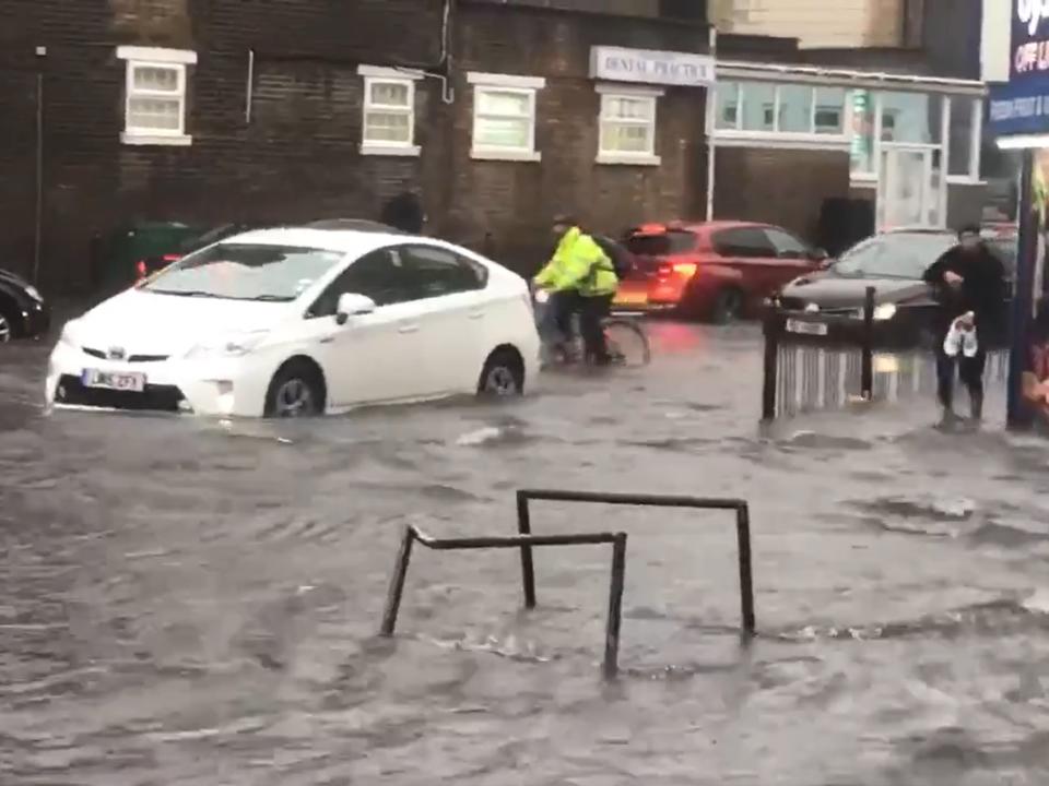 A car struggling along Turnpike Lane in north London (PA)