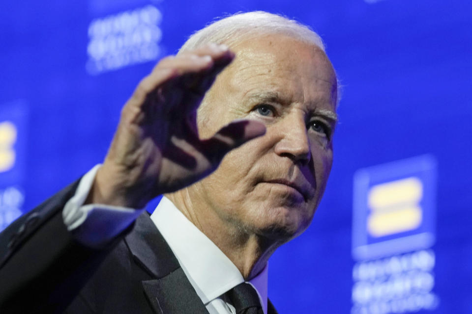 President Joe Biden waves to the crowd after speaking at the 2023 Human Rights Campaign National Dinner, Saturday, Oct. 14, 2023, in Washington. (AP Photo/Manuel Balce Ceneta)