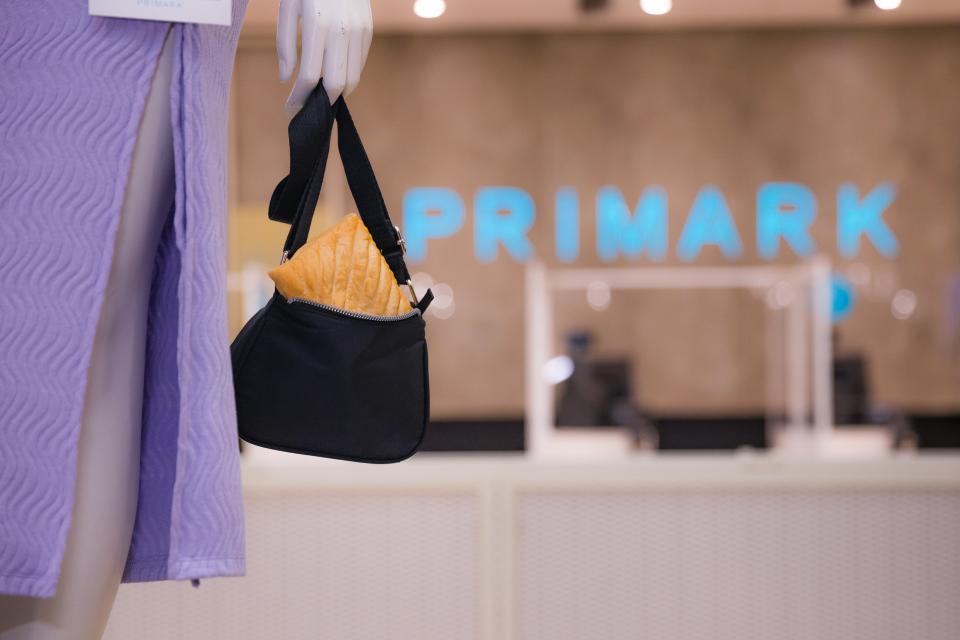 Shoppers across the UK were surprised to see Greggs steak bakes and vegan sausage rolls tucked into mannequins’ handbags. Photo: Primark