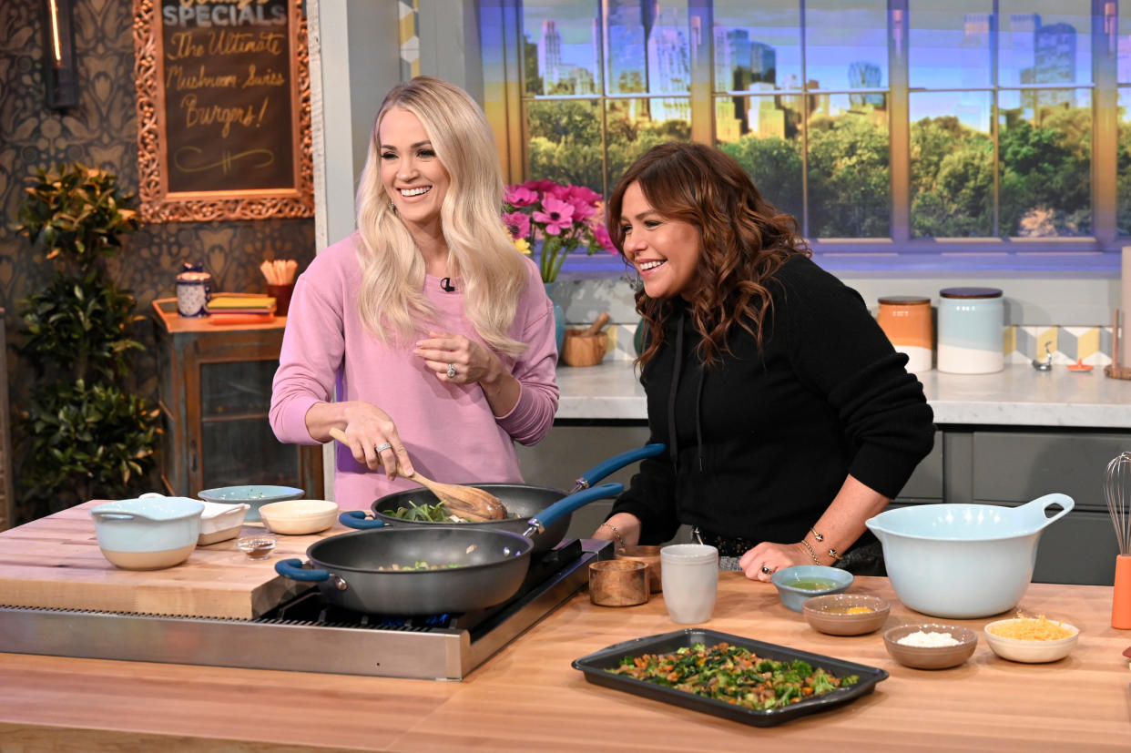  Rachael Ray and Carrie Underwood cook on the set of 'Rachael Ray.'. 