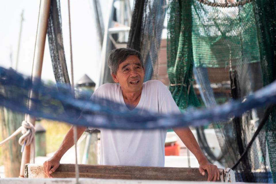 Sau Truong stands on his shrimping boat, Miss Mimi, at Bayou Caddy in Bay St. Louis on Thursday, June 29, 2023. Truong made shrimping his career after immigrating from Vietnam, but encouraged his children to pursue other careers.