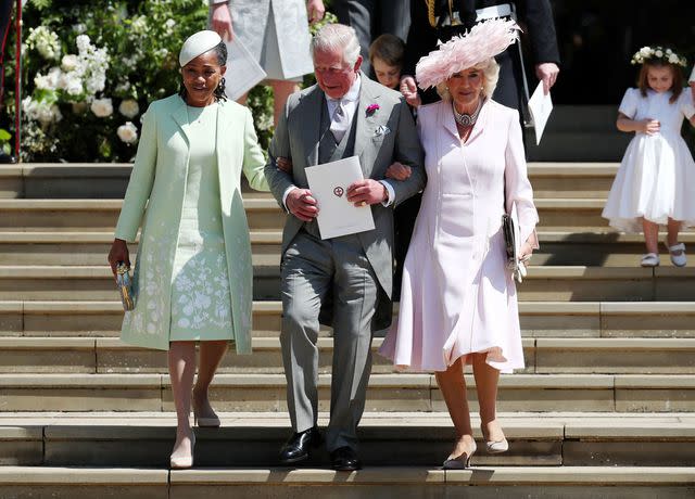 <p>JANE BARLOW/POOL/AFP via Getty </p> Doria Ragland, Prince Charles and Camilla at Prince Harry and Meghan Markle's 2018 royal wedding