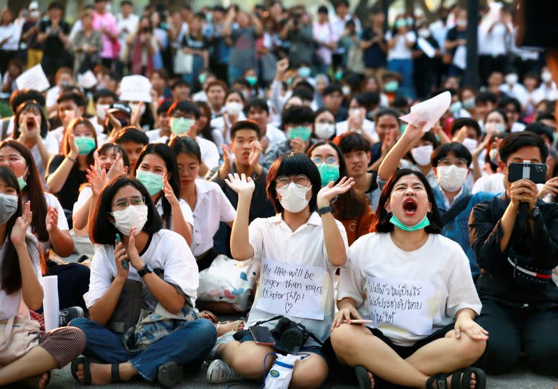 Thai students protest against a court's decision that dissolved the country's second largest opposition Future Forward party, less than a year after an election to end direct military rule, at Chulalongkorn University, in Bangkok