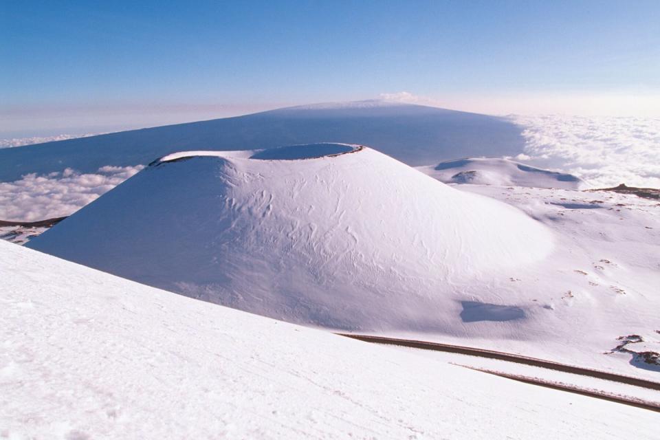 Snow coats the slopes of Mauna Kea, one of Hawaii's volcanoes