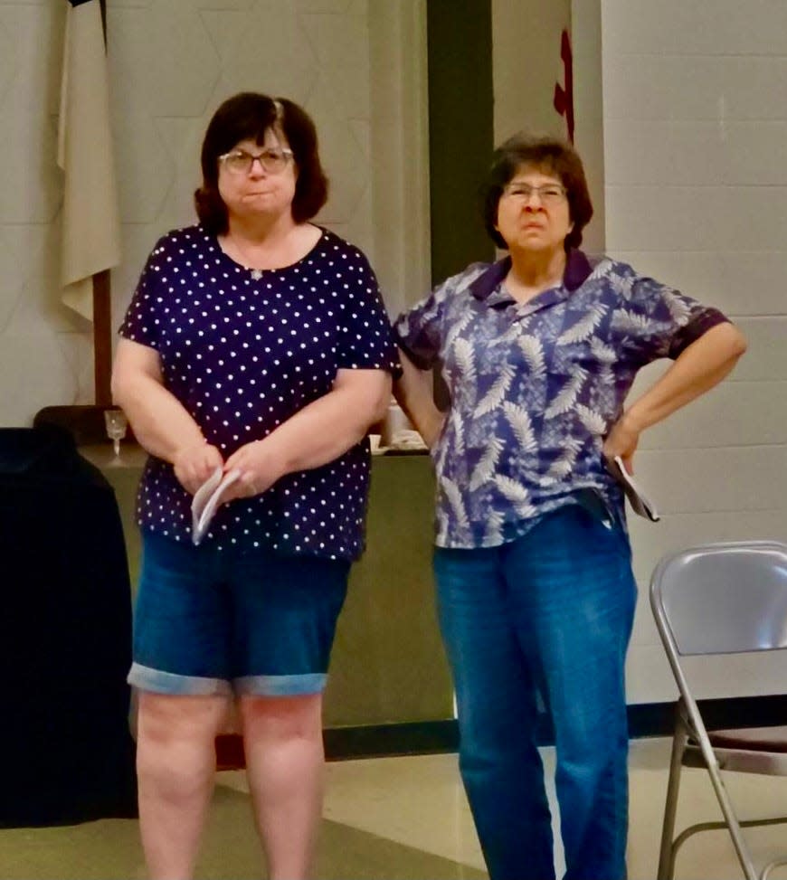 Carol Woodrum and Nancy Nickerson, as the Brewster sisters, rehearse a scene from the Lincoln Community Theatre production of Arsenic and Old Lace, which will be presented beginning June 23 at the Lincoln Community High School auditorium. Tickets are on sale now at lincolncommunitytheatre.org.