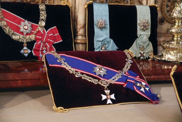 The duke's Danish and Greek links are clear with the Royal Victorian Order Collar and Badge, and the Royal Victorian Order Breast Star and Badge (front) and The Order of the Elephant (Denmark), and the Order of the Redeemer (Greece) (Steve Parsons/PA)