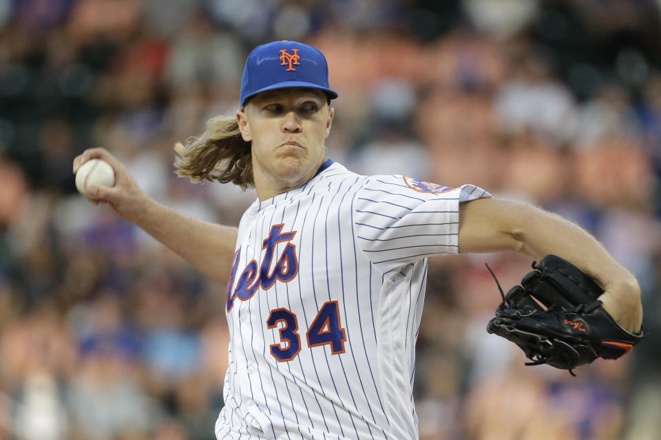 New York Mets starting pitcher Noah Syndergaard throws during the first inning of a baseball game against the Washington Nationals, Saturday, Aug. 10, 2019, in New York. (AP Photo/Seth Wenig)