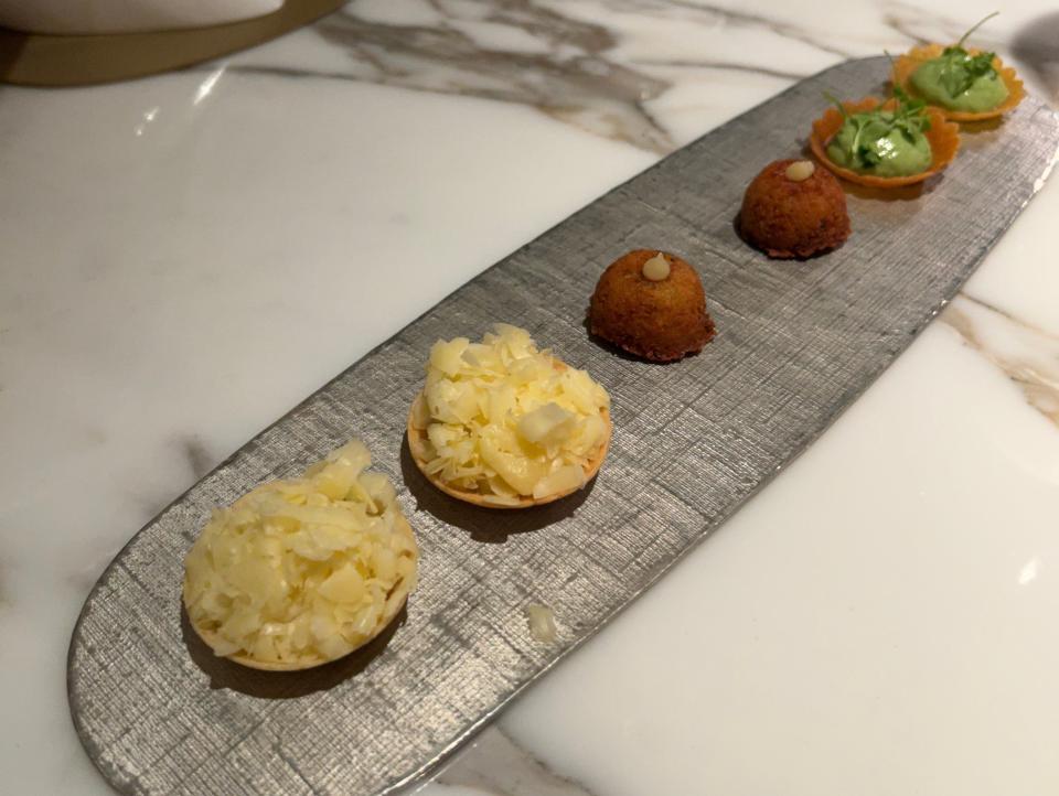 amuse busche course served on metal platter