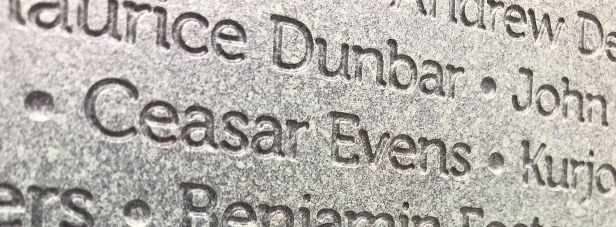Inset of Ceasar Evens' name on the "Boundless" sculpture on the grounds of the Cameron Art Museum. Evens settled his family in Brunswick County after the Civil War and many of his descendants are still in the area.