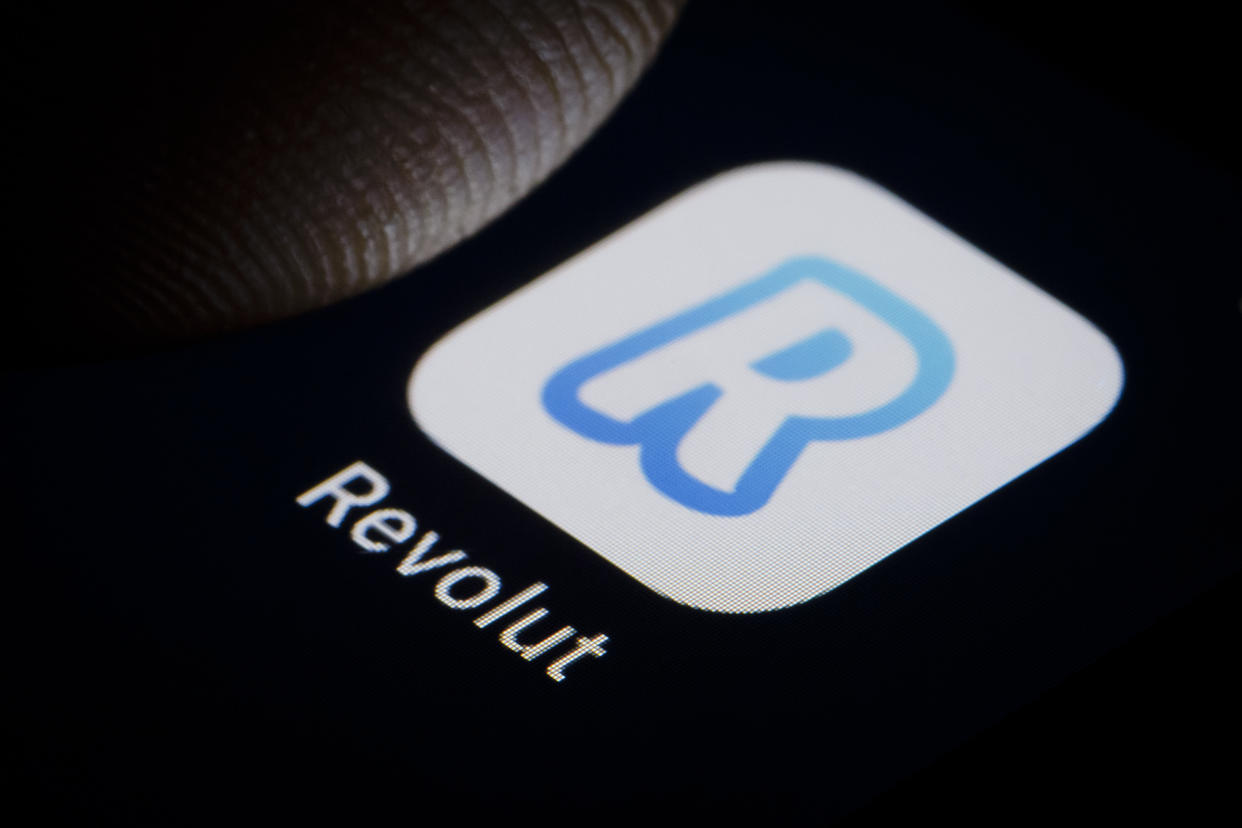 BERLIN, GERMANY - JANUARY 11: In this photo illustration the Logo of british online bank Revolut is displayed on a smartphone on January 11, 2019 in Berlin, Germany. (Photo Illustration by Thomas Trutschel/Photothek via Getty Images)