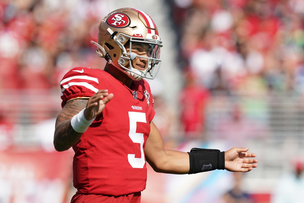 Oct 3, 2021; Santa Clara, California, USA; San Francisco 49ers quarterback Trey Lance (5) reacts after a pass during the third quarter against the Seattle Seahawks at Levi's Stadium. Mandatory Credit: Darren Yamashita-USA TODAY Sports