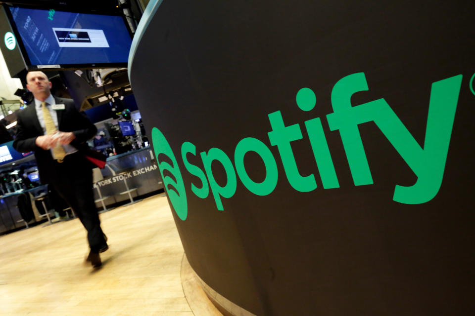 A trading post sports the Spotify logo on the floor of the New York Stock Exchange, Tuesday, April 3, 2018.