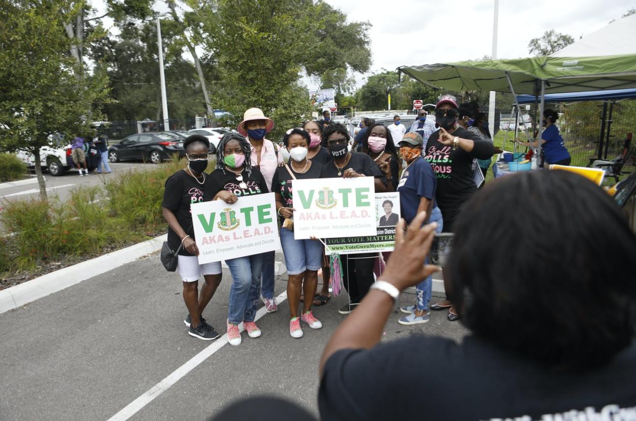 <span class="caption">Alpha Kappa Alpha sorority members at a get-out-the-vote event in 2020</span> <span class="attribution"><a class="link " href="https://www.gettyimages.com/detail/news-photo/members-of-alpha-kappa-alpha-sorority-pose-for-a-photo-news-photo/1229406551?adppopup=true" rel="nofollow noopener" target="_blank" data-ylk="slk:Octavio Jones/Getty Images;elm:context_link;itc:0;sec:content-canvas">Octavio Jones/Getty Images</a></span>