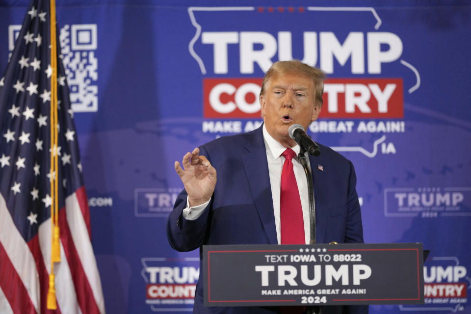 FILE - Former President Donald Trump speaks during a Commit to Caucus rally, Saturday, Dec. 2, 2023, in Ankeny, Iowa. Experts in political messaging say former President Donald Trump’s remarks that his supporters must “guard the vote” in 2024 are potentially dangerous and could lead to confrontations at polling place. (AP Photo/Matthew Putney, File)