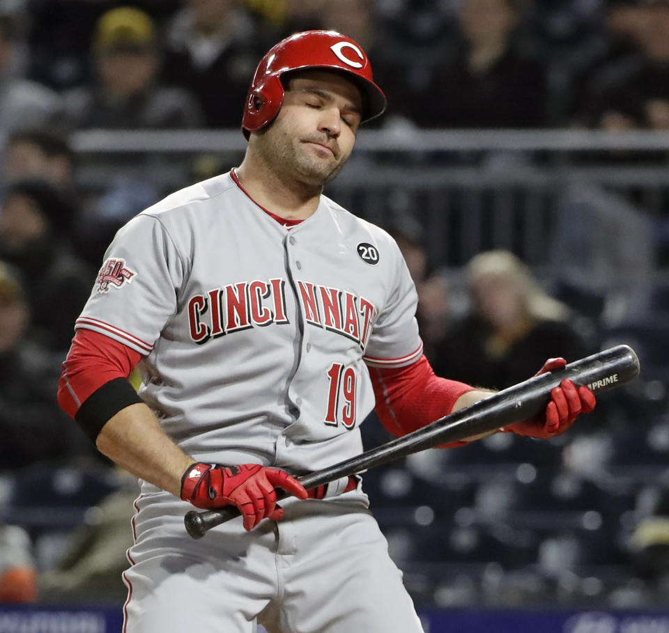 Cincinnati Reds' Joey Votto reacts after striking out against Pittsburgh Pirates relief pitcher Felipe Vazquez in the ninth inning of a baseball game in Pittsburgh, Friday, April 5, 2019. (AP Photo/Gene J. Puskar)