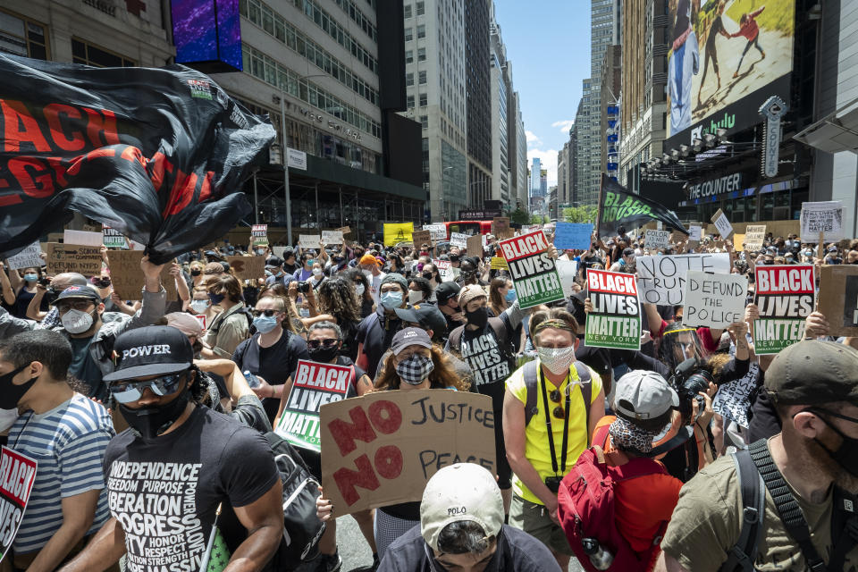 MANHATTAN, NY - JUNE 07:  Thousands of protesters wearing masks and holding signs crowd into Times Square to support Black Lives Matter.  This was part of the Black Lives Matter New York (BLMNY) protest that offered a Blueprint for change and called on New York state legislators and members of Congress to end the slaughter of Black persons by the very institutions charged with protecting them.  The Blueprint is a policy platform to reform failed statutes and regulations and to  begin reforming to a more civil and just society. This includes the I Can't Breathe Act, the Blue Wall Act, repealing of 50-A statute and includes housing and education reforms. Protesters keep taking to the streets across America and around the world after the killing of George Floyd at the hands of a white police officer Derek Chauvin that was kneeling on his neck during his arrest as he pleaded that he couldn't breathe. The protest are attempting to give a voice to the need for human rights for African American's and to stop police brutality against people of color.  Many people were wearing masks and observing social distancing due to the coronavirus pandemic.  Photographed in the Manhattan Borough of New York on June 07, 2020, USA.  (Photo by Ira L. Black/Corbis via Getty Images)"n"n"n