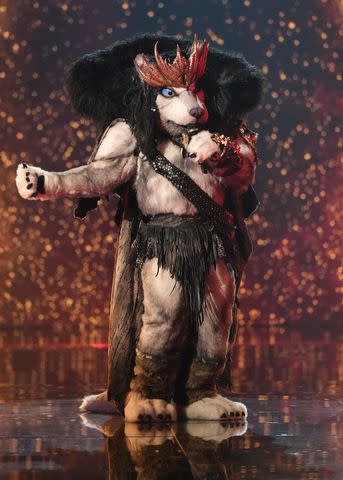 <p>Michael Becker / FOX</p> Husky performing on 'The Masked Singer.'