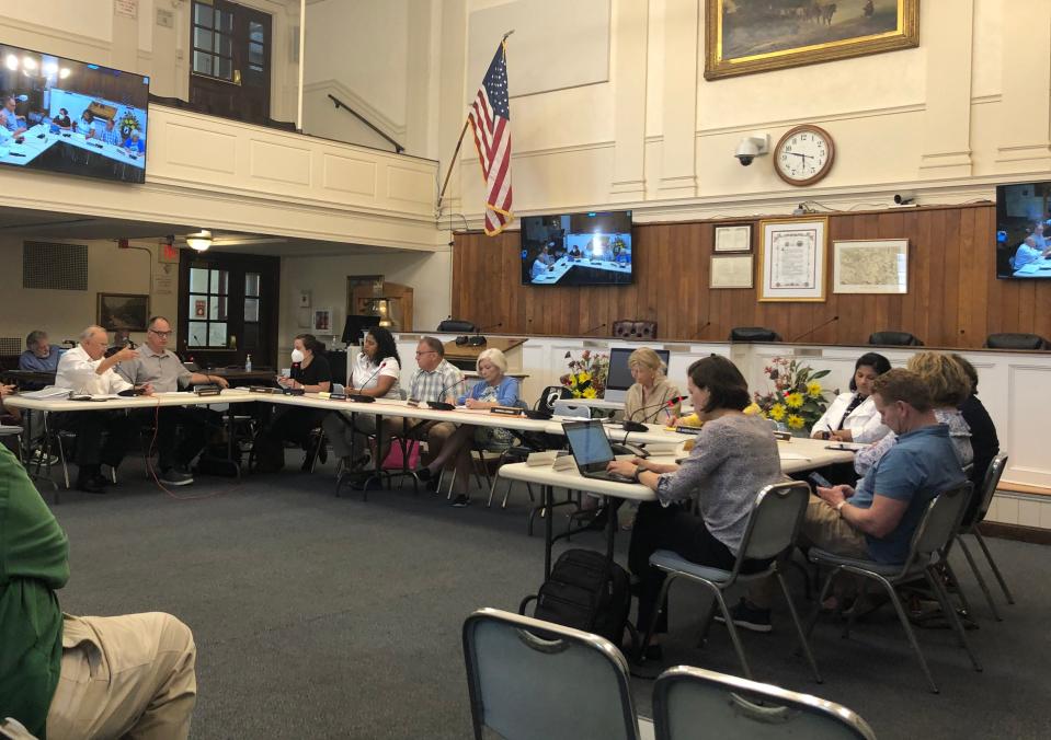 Members of the Newport City Council, School Committee and administration meet jointly for a workshop on proposed school regionalization on May 31 at City Hall.