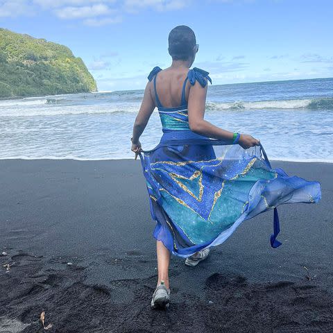 <p>Tiffany Haddish/ Instagram</p> Tiffany Haddish is seen posing in front of a beach during a trip to Hawaii