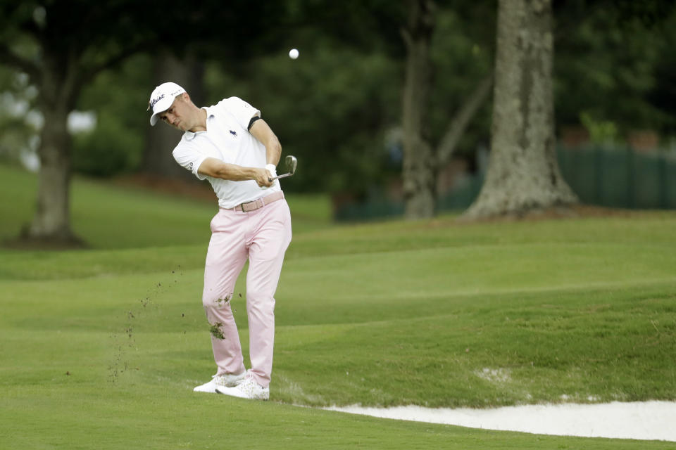 Justin Thomas hits from the rough on the 16th hole during the final round of the World Golf Championship-FedEx St. Jude Invitational Sunday, Aug. 2, 2020, in Memphis, Tenn. (AP Photo/Mark Humphrey)