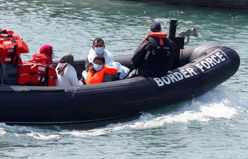 FILE PHOTO: Migrants are brought to Dover harbour by Border Patrol, in Dover