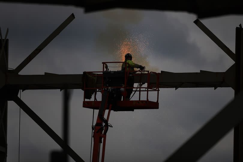 Work is ongoing -Credit:Sean Hansford | Manchester Evening News