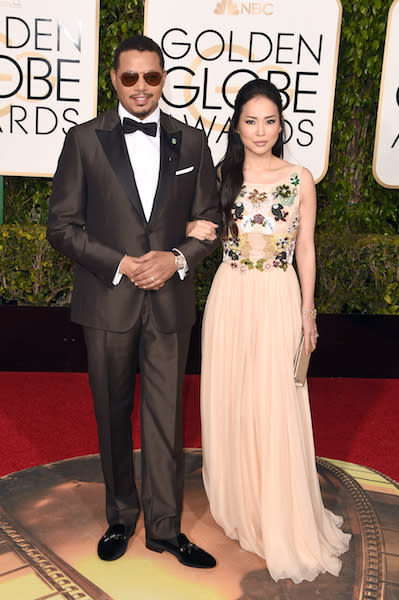 Terrence Howard in a metallic brown tuxedo at the 73rd Golden Globe Awards.