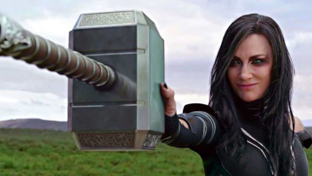 Hela stopping Thor's hammer.