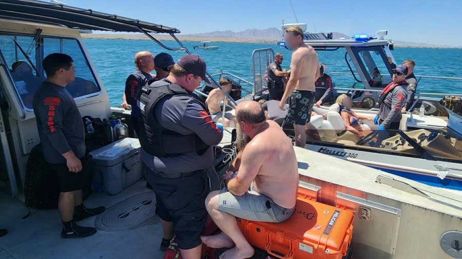 Rescuers tend to people after a boat crashed while going about 50 mph at Lake Havasu on Sunday, May 26, 2024. (Photo: Mohave County Sheriff’s Office)