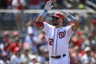 Washington Nationals' Kyle Schwarber celebrates his home run during the fifth inning of a baseball game against the New York Mets, Sunday, June 20, 2021, in Washington. (AP Photo/Nick Wass)