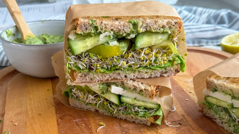 vegetable sandwich with tomato cucumber sprouts