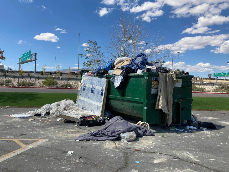 An overflowing dumpster is seen in the Grand Sierra Resort and Casino parking lot in Reno (AP)