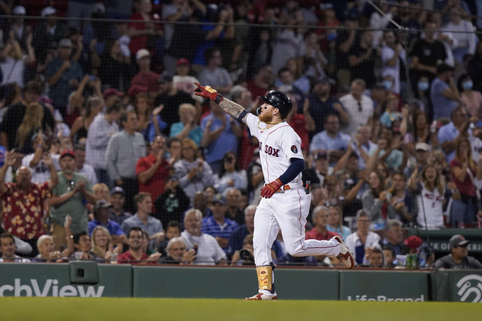 Boston Red Sox's Alex Verdugo celebrates after his home run as he runs the bases in the sixth inning of a baseball game against the Texas Rangers, Thursday, Sept. 1, 2022, in Boston. (AP Photo/Steven Senne)