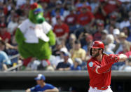 Philadelphia Phillies' Bryce Harper bats against the Toronto Blue Jays during the third inning of a spring training baseball game Saturday, March 9, 2019, in Clearwater, Fla. (AP Photo/Chris O'Meara)