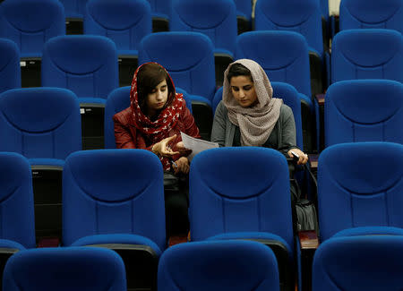 Female students of American University of Afghanistan attend new orientation sessions at a American University in Kabul. REUTERS/Mohammad Ismail