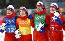 Ski Jumping - Pyeongchang 2018 Winter Olympics - Men’s Team Final - Alpensia Ski Jumping Centre - Pyeongchang, South Korea - February 19, 2018 - Gold medalists Daniel Andre Tande, Andreas Stjernen, Johann Andre Forfang and Robert Johansson of Norway celebrate during the victory ceremony. REUTERS/Dominic Ebenbichler