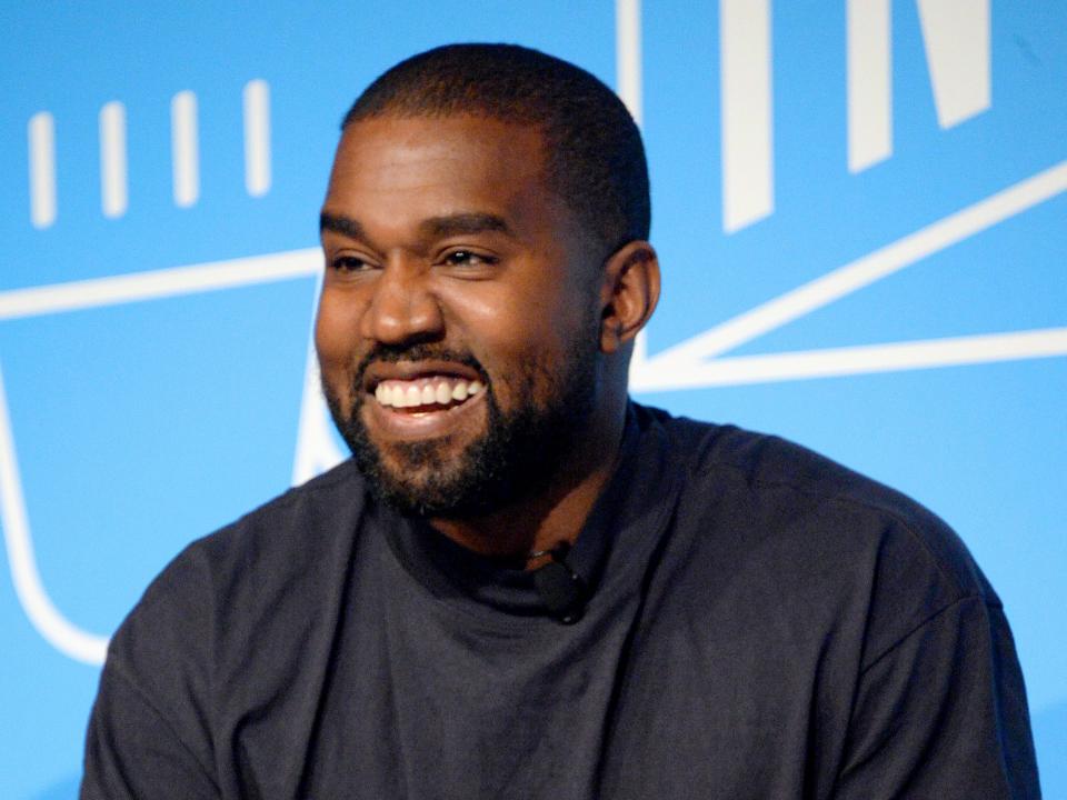 Kanye West on stage at the "Kanye West and Steven Smith in Conversation with Mark Wilson"