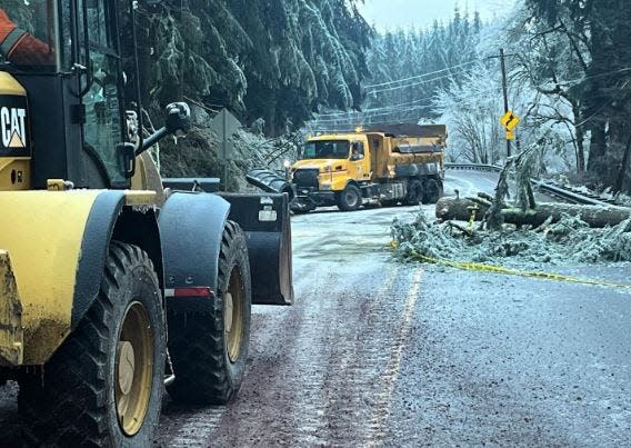 Highway 20 was closed 2 miles east of Shea View Point near Sweet Home while crews cleaned up trees downed in a winter storm.