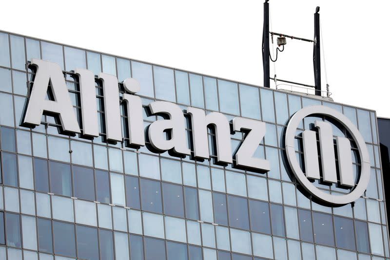 FILE PHOTO: The logo of insurer Allianz SE is seen on the company building in Puteaux at the financial and business district of La Defense near Paris